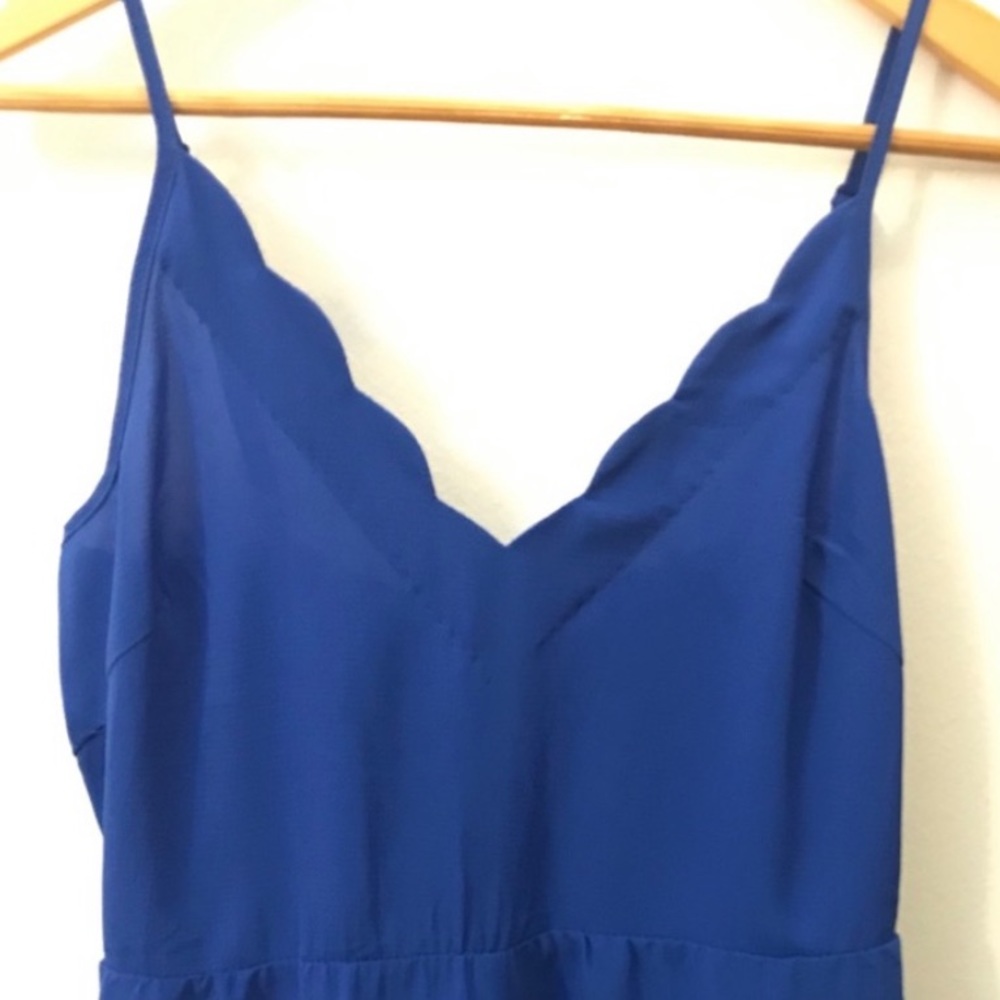 Lush blue scalloped romper. Size M